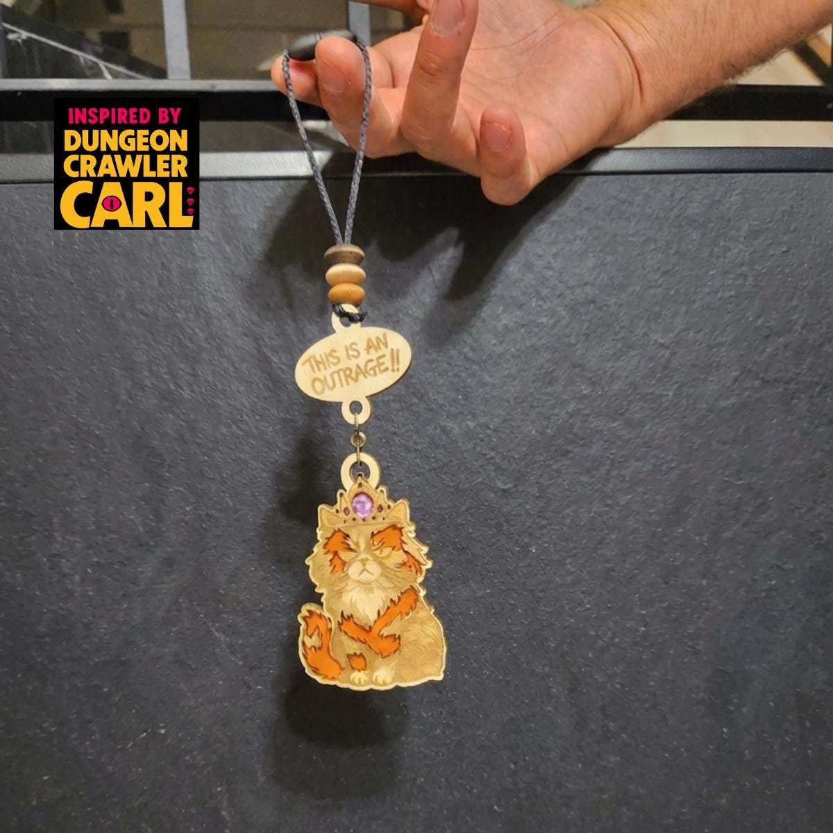 Dungeon crawler carl inspired car charm – princess donut "this is an outrage and quot;